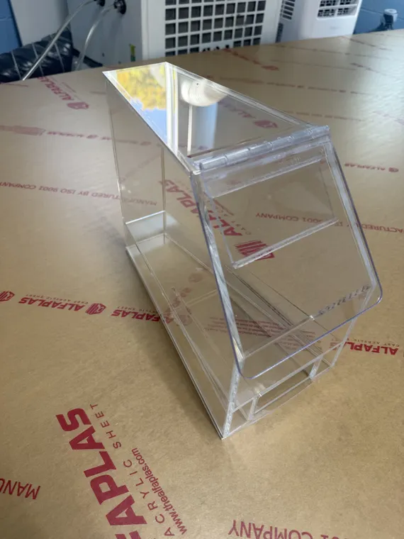 Clear acrylic display box with interior shelves