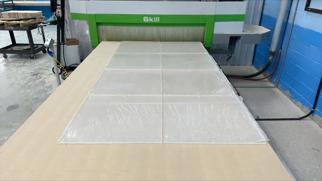 Large acrylic profiles on a CNC machining table