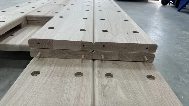 Hardwood parts with shaped ends and drilled holes