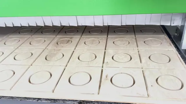 Repeated rectangular parts with circular pockets on a CNC bed