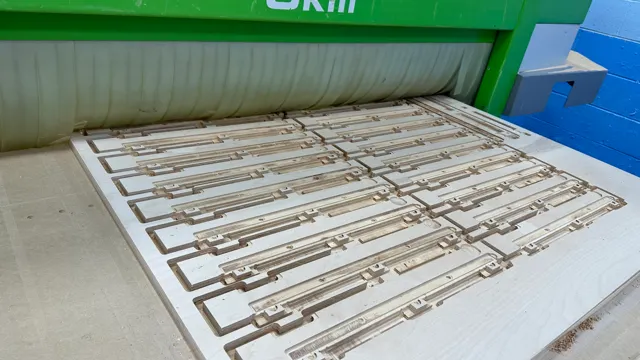 Nested wood components cut from a sheet on a Biesse CNC router