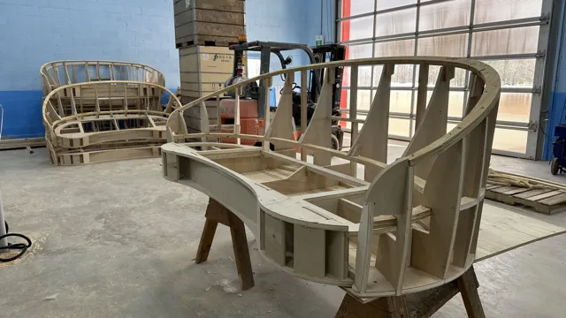 Unfinished wooden bench frame inside the workshop