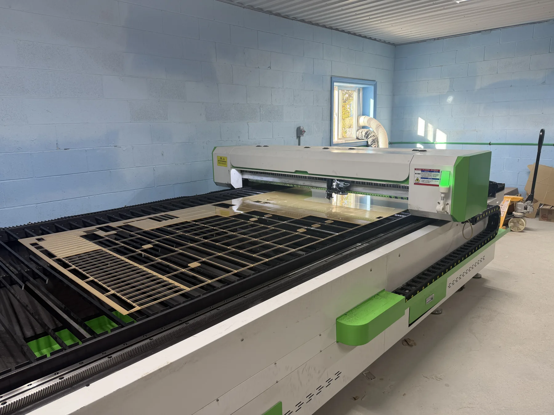 Bescutter 300-watt CO₂ laser with a 4 by 8 foot cutting bed at Cedar Hedge Millworks